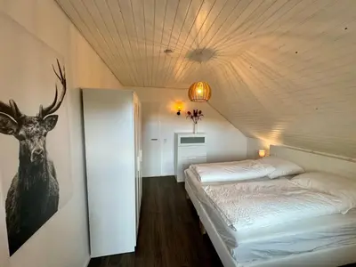 Ein Bett oder Betten in einem Zimmer der Unterkunft Odenwaldpanorama