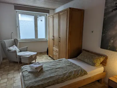 Ein Bett oder Betten in einem Zimmer der Unterkunft Ferienwohnungen Schallenberg Fewo Nr 6