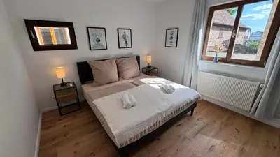 Ein Bett oder Betten in einem Zimmer der Unterkunft Design Apartment im Schlossareal Deidesheim