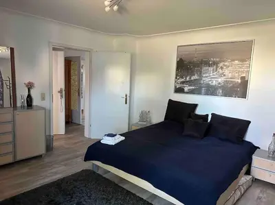 Ein Bett oder Betten in einem Zimmer der Unterkunft Ferienwohnung für bis 5 Personen