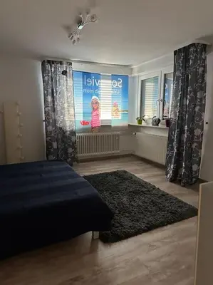 Ein Bett oder Betten in einem Zimmer der Unterkunft Ferienwohnung für bis 5 Personen