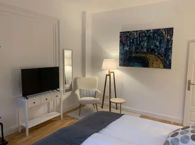 Ein Bett oder Betten in einem Zimmer der Unterkunft Charmante Altbauwohnung
