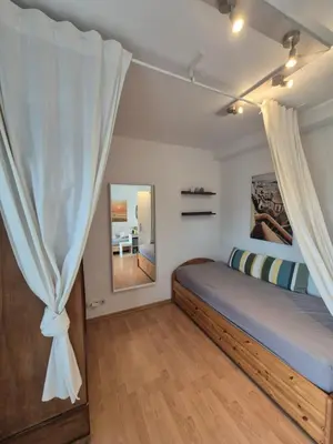 Ein Bett oder Betten in einem Zimmer der Unterkunft Helle, komfortabel und zentral gelegene Wohnung