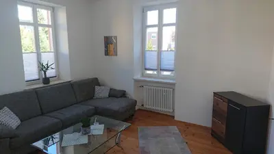 Ein Sitzbereich in der Unterkunft Ferienwohnung Weinstraßenmitte