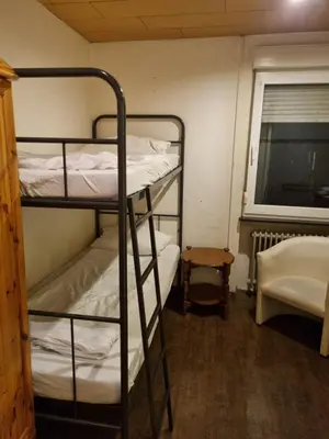 Ein Bett oder Betten in einem Zimmer der Unterkunft Hafen