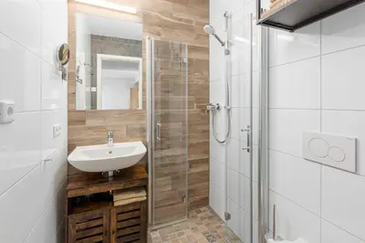 Ein Badezimmer in der Unterkunft Maxim Apartments