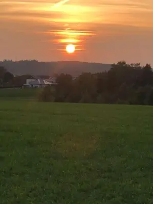 Blick auf den Sonnenuntergang/Sonnenaufgang von der Ferienwohnung aus oder aus der Nähe