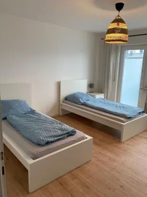 Ein Bett oder Betten in einem Zimmer der Unterkunft 3 Zimmer Küche Bad - Monteurwohnung in ruhiger Lage