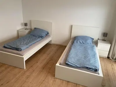Ein Bett oder Betten in einem Zimmer der Unterkunft 3 Zimmer Küche Bad - Monteurwohnung in ruhiger Lage