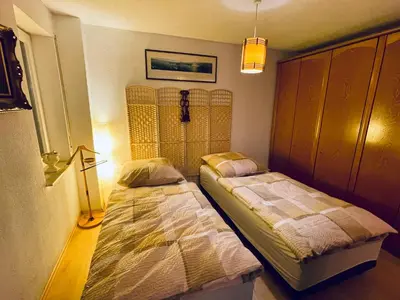 Ein Bett oder Betten in einem Zimmer der Unterkunft Goldstadt Wohlfühl-Suite Zentrale Lage im Herzen von Pforzheim