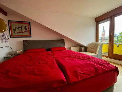 Ein Bett oder Betten in einem Zimmer der Unterkunft Goldstadt City Loft 3-Zimmer Balkon & Garage Zentrum Pforzheim