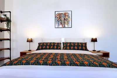 Ein Bett oder Betten in einem Zimmer der Unterkunft MAWULO Studio Neustadt Zentrum