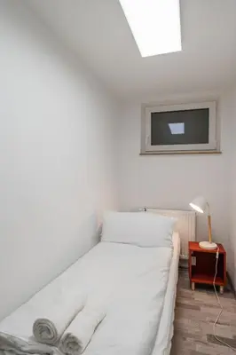 Ein Bett oder Betten in einem Zimmer der Unterkunft Kaffeehof 3