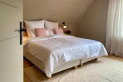 Ein Bett oder Betten in einem Zimmer der Unterkunft Das Winzereck - 4 Sterne Ferienhaus in der Südpfalz