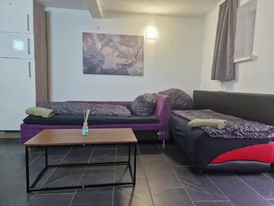 Ein Sitzbereich in der Unterkunft Appartement Somptueux a Unterheinriet