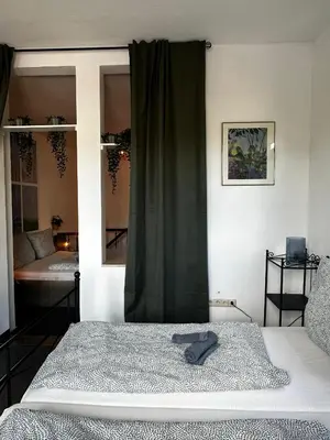Ein Bett oder Betten in einem Zimmer der Unterkunft Maisonettewohnung im Loft Stil mit wunderschöner Terrasse