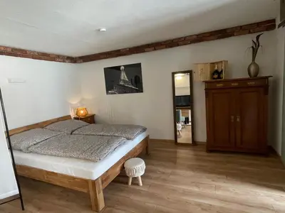 Ein Bett oder Betten in einem Zimmer der Unterkunft SmartAppart Rheinstetten
