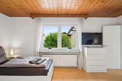 Ein Bett oder Betten in einem Zimmer der Unterkunft RI01 Apartment mit großem Balkon