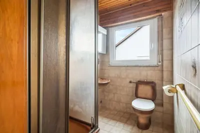 Ein Badezimmer in der Unterkunft RI01 Apartment mit großem Balkon