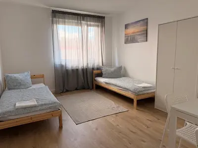 Ein Bett oder Betten in einem Zimmer der Unterkunft Ferienwohnung Oppenheim