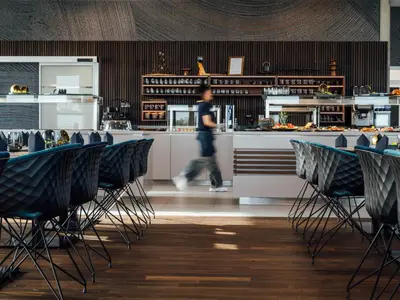 Ein Restaurant oder anderes Speiselokal in der Unterkunft MEET EAT SLEEP das Konferenzzentrum in Karlsruhe