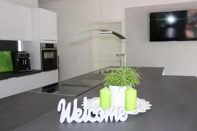 Küche/Küchenzeile in der Unterkunft Residenz Waldblick 5 STERNE Penthouse-Ferienwohnung Klassifizierung DTV