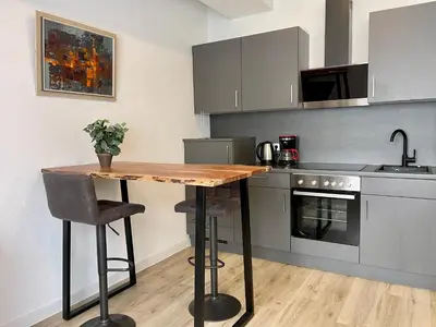 Küche/Küchenzeile in der Unterkunft Goldstadt Comfort Suite - City Apartment Schlössle