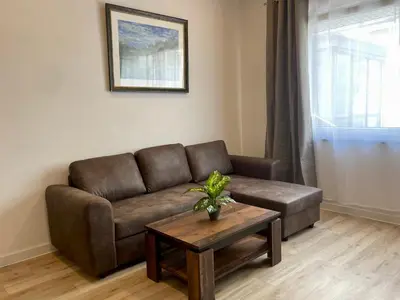 Ein Sitzbereich in der Unterkunft Goldstadt Comfort Suite - City Apartment Schlössle
