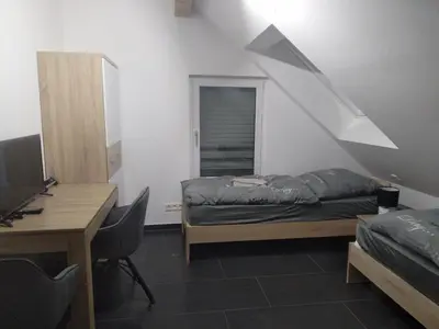 Ein Bett oder Betten in einem Zimmer der Unterkunft Haus Pleidelsheim