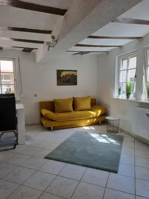 Ein Sitzbereich in der Unterkunft Ferienwohnung Heppenheim an der Bergstraße WHG 1