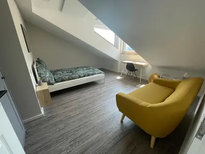Ein Sitzbereich in der Unterkunft Smart Apartment Heidelberg