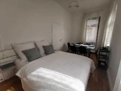 Ein Bett oder Betten in einem Zimmer der Unterkunft Helle Stadtwohnung Miltenberg Perle am Main