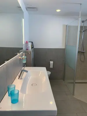 Ein Badezimmer in der Unterkunft FeWo Lina - Komfortwohnung mit Badewanne, Kamin & Klima