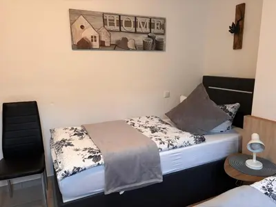 Ein Bett oder Betten in einem Zimmer der Unterkunft Am Dollespark