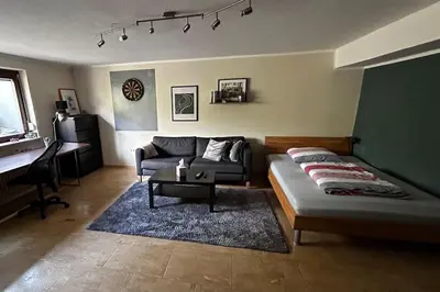 Ein Bett oder Betten in einem Zimmer der Unterkunft Ruhige Wohnung am Ortsrand - nahe KIT-Campus Nord