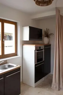 Küche/Küchenzeile in der Unterkunft Modern Boho-Style Apartment
