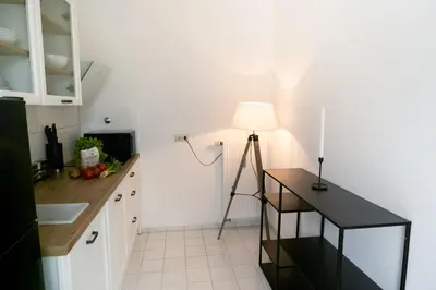 Küche/Küchenzeile in der Unterkunft BELLA - Business&Family - 2 Zimmer direkt neben Schloß, Parkplatz, SmartTV, Netflix, Waschmaschine, 24h Checkin, 71qm, Kingsizebett, Hotelbettwäsche