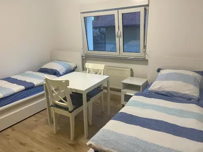 Ein Bett oder Betten in einem Zimmer der Unterkunft Easy Living Neckarsulm Zentrum