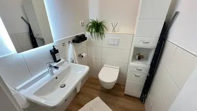 Ein Badezimmer in der Unterkunft Das Loft - Sauna - 4 Schlafzimmer - 2 Bäder - Stadtmitte - 2 Parkplätze