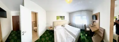 Ein Bett oder Betten in einem Zimmer der Unterkunft Hotel Dreieich