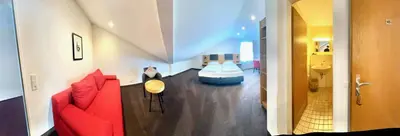 Ein Bett oder Betten in einem Zimmer der Unterkunft Hotel Dreieich
