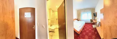 Ein Badezimmer in der Unterkunft Hotel Dreieich
