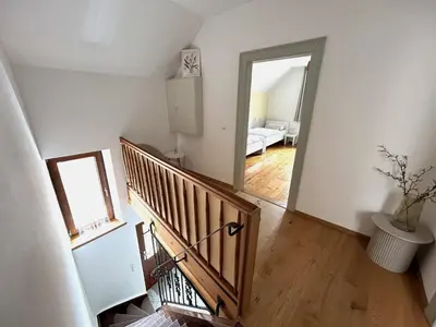 Ein Bett oder Betten in einem Zimmer der Unterkunft Ferienhaus Haisel Vier