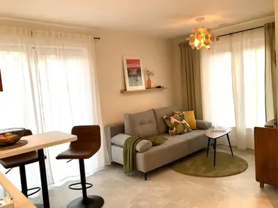 Ein Sitzbereich in der Unterkunft Appartment SPATZENNEST