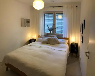 Ein Bett oder Betten in einem Zimmer der Unterkunft Appartment SPATZENNEST
