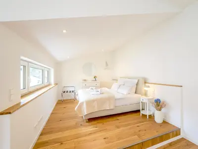 Ein Bett oder Betten in einem Zimmer der Unterkunft Hinterhof-Juwel mit Küche und Smart-TV