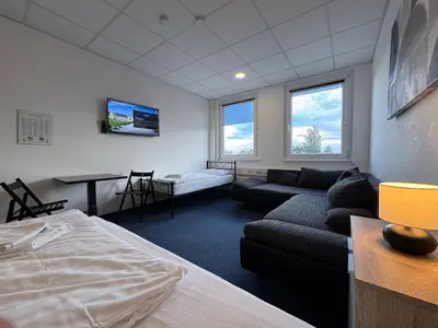 TV/Unterhaltungsangebot in der Unterkunft Thuja Apartments Karlsruhe-Neureut by KurzZeit