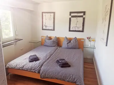 Ein Bett oder Betten in einem Zimmer der Unterkunft Ferienwohnung Bergblick