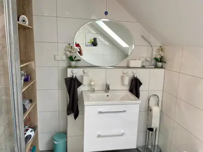 Ein Badezimmer in der Unterkunft my HOME SWEET HOME