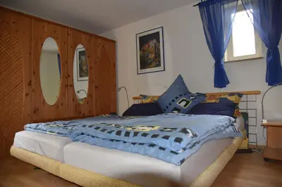 Ein Bett oder Betten in einem Zimmer der Unterkunft Ferienwohnung im Pfälzerwald